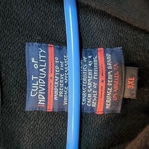 Black zip-up hoodie with zipper on hood also